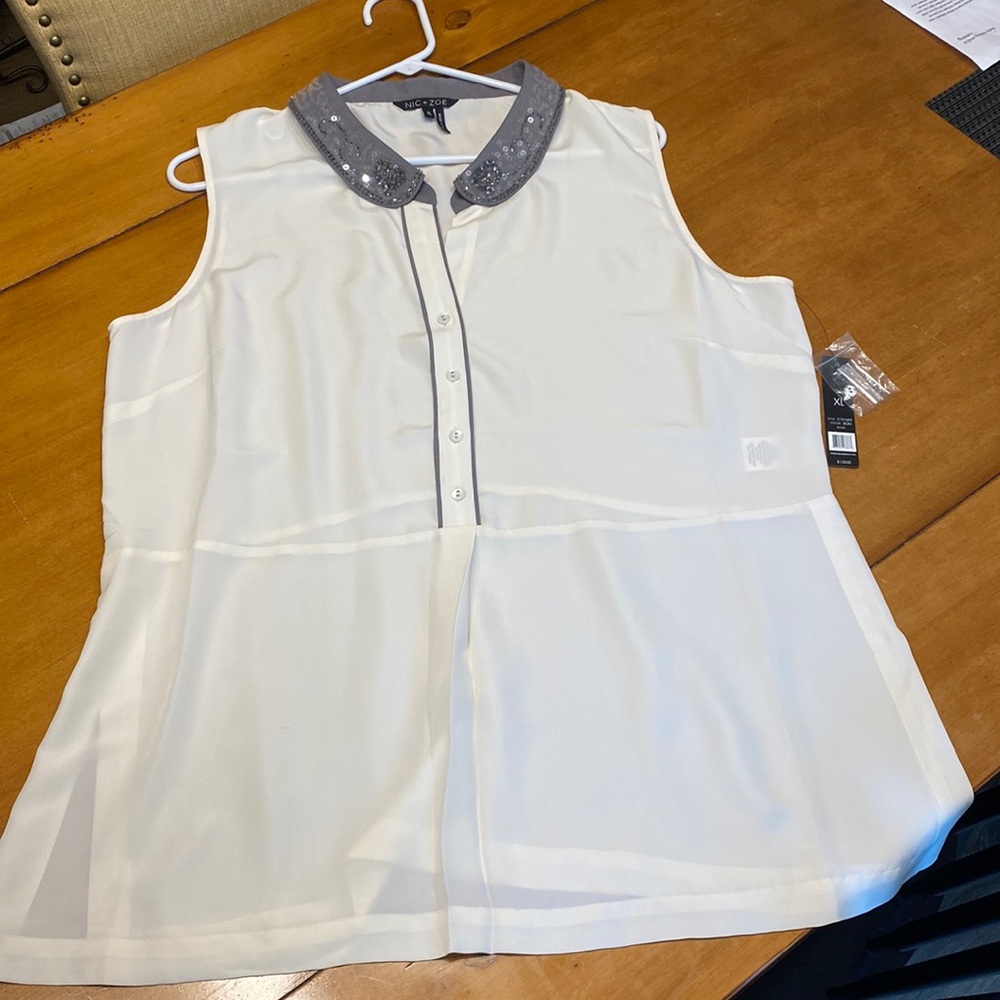 Bone colored blouse with grey beaded collar.